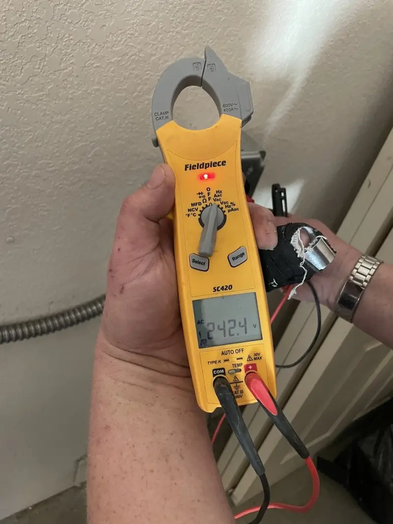 Voltage testing with clamp meter during Aluminum Wiring Replacement in Bartlett